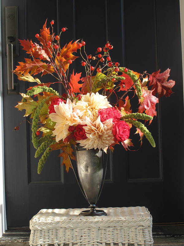 An autumn bouquet of roses, dahlias, millet, oak foliage, and rose hips designed by Prinzing. Photo courtesy of Debra Prinzing.